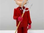 Madoff, in a Devil Suit