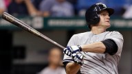 Overbay Homers in 11th, Yanks Beat Rays