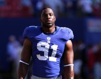 Giant Worry: Tuck Suits Up; Does Not Practice