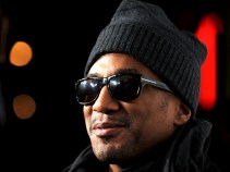 Q-Tip Eats Popcorn While Going Full-Zip on the Hoodie