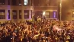 RAW VIDEO: Boston Residents Take to Streets, Sing 