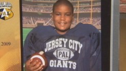 Woman Arraigned for Murder of 12-Year-old Boy
