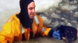 Firefighter Saves Struggling Dog