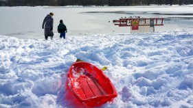 Kids and Adults Head to Parks for Snow Fun