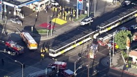 Bus, Train Collide Near Downtown