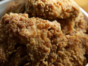 Temple Bomb Bunglers Employ Fried-Chicken Defense