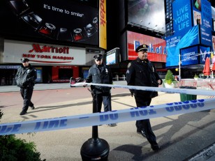 Police Shoot Armed Man Dead in Times Square