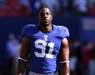 Giant Worry: Tuck Suits Up; Does Not Practice