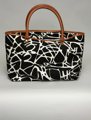 Nine Designers Create Solar-Powered Bags for Charity