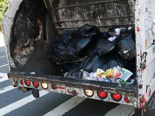 Man Scooped up by Calif. Garbage Truck Survives Ride