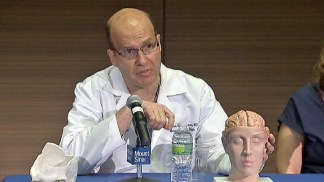 Stabbed Officer "Lucky," Doc Says