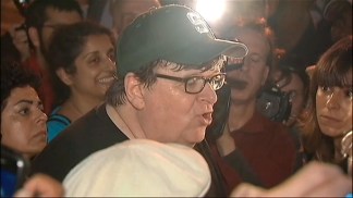 Filmmaker Michael Moore Visits Wall Street Protest