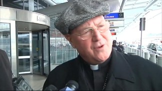 Timothy Cardinal Dolan Heads to Rome for Pope Resignation