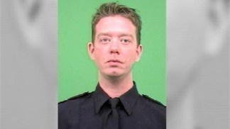 Cop Saved by Gunbelt in Shootout