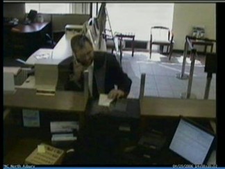 Dwek Tries to Cash a Phony Check