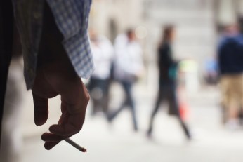 Magician Sets Cigarette Eating Record