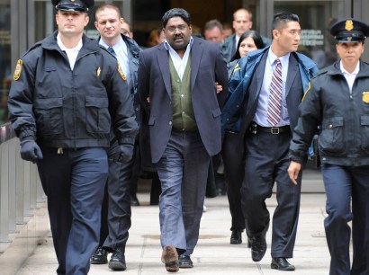 Raj Rajaratnam, billionaire founder of the Galleon Group, a major hedge fund, is led in handcuffs from FBI headquarters today. Raj Rajaratnam, billionaire founder of the Galleon Group, a major hedge fund, is led in handcuffs from FBI headquarters today.