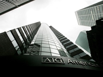 The new funding, the fourth government rescue of AIG since September, is intended to support the New York-based insurer as it is expected to announce $60 billion in quarterly losses early Monday.