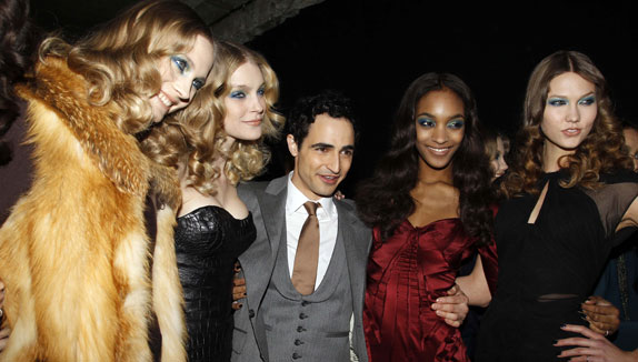 Backstage Shot: Zac Posen with a Bevy of Models
