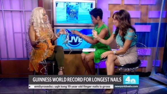WOMAN WITH THE LONGEST NAILS IN THE WORLD!