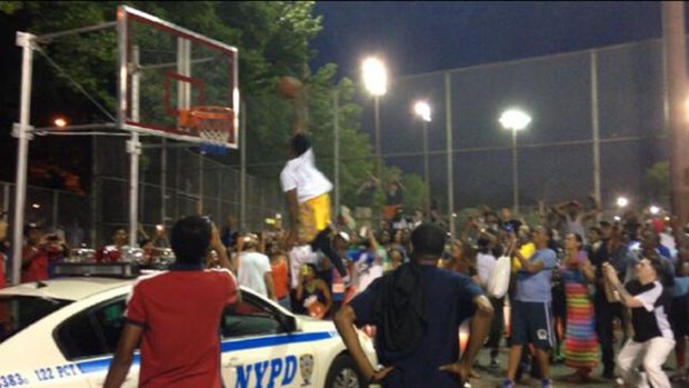[NY] Staten Islander Slam-Dunks Basketball Over NYPD Car