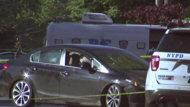 New York officer dragged by car, critically injured; 2 in custody New York officer dragged by car, critically injured; 2 in custody