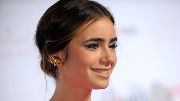 Lily Collins Lands Snow White
