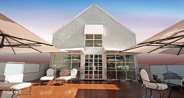$2.5M for Eric Clapton's Former Pad and Exclusive Record