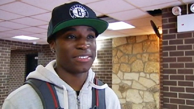 A 19-year-old college student from Queens says he was handcuffed and locked in a jail cell after buying a $350 designer belt at Barneys on Madison Avenue because he is