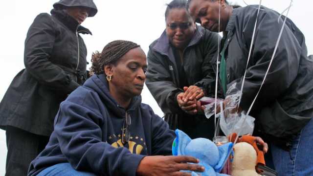Photos: Boy Escapes as Mom Drives into River