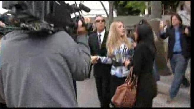 Charlie Sheen's estranged wife visits the downtown LA courthouse.
