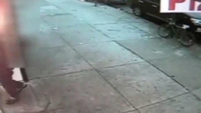 Police are trying to locate the man seen in this video shooting another man in front of 2085 Nostrand Ave. in Brooklyn last Saturday at about 7:30 p.m.