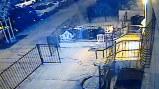 This chilling surveillance video shows one victim running after being shot, and then the suspect turning to shoot at responding NYPD officers. He falls after police fire, raising his arm to shoot again. He was later taken into custody.
