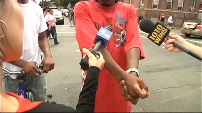NYPD detectives opened fire on two pit bulls that charged at them while they were chasing a suspected drug dealer in Brooklyn Tuesday and accidentally shot a bystander in the leg, authorities said.  News 4's Lori Bordonaro reports.