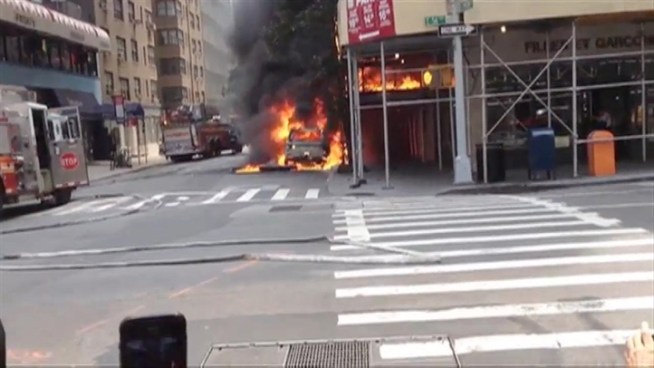 An exploding transformer may have caused Saturday's car explosion on a Midtown Manhattan street, authorities say. This video was filmed by Nikhil Abraham.