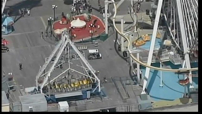 The girl's car was about halfway toward the top of the Ferris Wheel on Morey's Pier when she fell -- the equivalent of about five stories, police said.