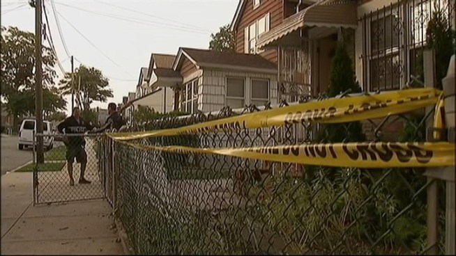 The eldest son of a couple shot execution-style in their bedroom as they slept demands the killer surrender.