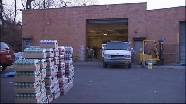 A group of men lit a garbage bag filled with four dogs on fire near a dumpster in Brooklyn, then fled in a vehicle, authorities say. Gus Rosendale reports. Read the full story <a href=