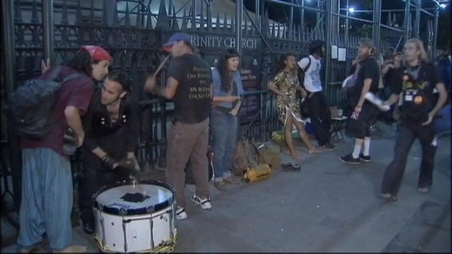 About 300 people observing the one-year anniversary of Occupy Wall Street marched Saturday night to a small concrete park in lower Manhattan that served as headquarters for the protest movement and was its birthplace. Gus Rosendale reports.
