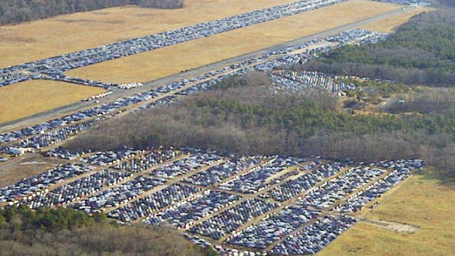 Environmentalists are complaining about an old airfield on Long Island being used to store cars damaged by Sandy, citing public health concerns. Town and company officials say there's no threat. Greg Cergol reports.