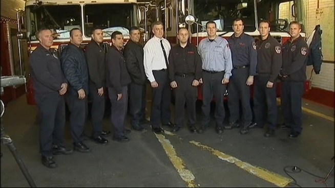 Member of New York's Bravest sprang into action and pulled residents from a burning Dongan Hills home.