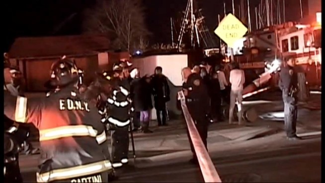 Authorities say a floor of a three-story house in Queens where a large St. Patrick's Day party was taking place collapsed, injuring a dozen people.