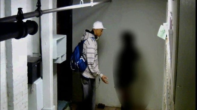 Police are searching for the man in this surveillance video, suspected of raping a woman in a Williamsburg, Brooklyn building on Nov. 17. Anyone with information is asked to contact Crime Stoppers at 800-577-TIPS.