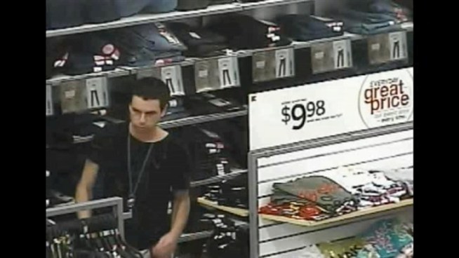 Police in New Jersey are trying to track down a man captured on surveillance video, dancing as he checks out clothing during an attempted shoplifting trip at K-Mart.