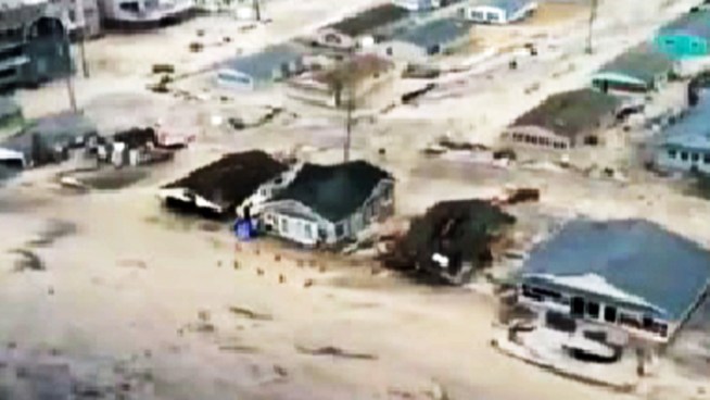 Aviators of the 1-150th Assault Helicopter Battalion, New Jersey National Guard, look for displaced residents along the New Jersey coastline Oct. 30, in the aftermath of Hurricane Sandy.