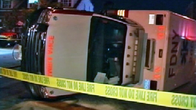 An ambulance that collided with an SUV in Brooklyn and rolled over, hurting three people, did not have its emergency lights on, surveillance video shows. Pei-Sze Cheng reports.
