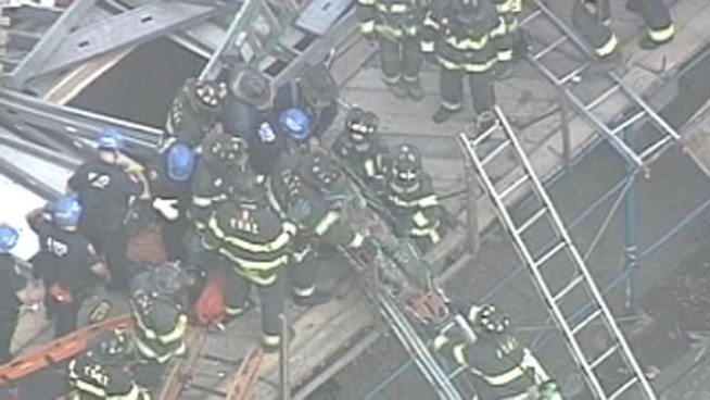 A building that was under construction in Brighton Beach, Brooklyn, collapsed suddenly Tuesday, trapping construction workers.