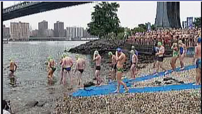 More than 500 swimmers competed Sunday in the seventh annual Brooklyn Bridge Swim, a 1-kilometer race across the East River from Brooklyn to Manhattan.