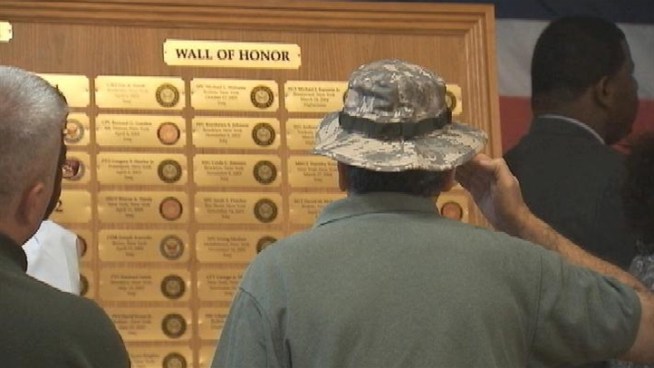 A traveling memorial has been unveiled, honoring the fallen military men and women of New York. The names of more than 260 servicemen and women from the Empire State are engraved on gold plates on six walls. Members of the 