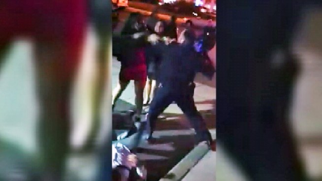 Police in New Jersey are investigating an incident where an officer appears to punch a woman in the face. Cell phone footage shows the brawl outside a New Jersey nightclub. Read the full story <a href=